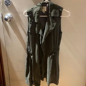 Small long dark green vest